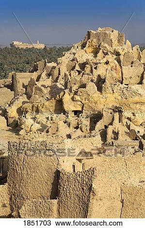 Stock Image - Shali Fortress, Siwa Town, Egypt, Africa; The Temple of the Oracle in the background. Fotosearch