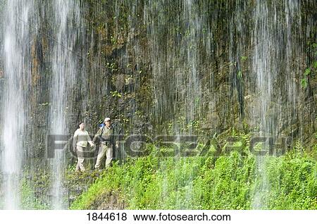 Silver Falls State Park Oregon USA; Hikers behind Middle North Falls View Large Photo Image Stock Photo - Silver Falls State Park Oregon USA; Hikers behind Middle North Falls. Fotosearch