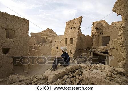 Siwa, Siwa Oasis, Egypt; Man overlooking Fortress of Shali View Large Photo Image Stock Image - Siwa, Siwa Oasis, Egypt; Man overlooking Fortress of Shali. Fotosearch