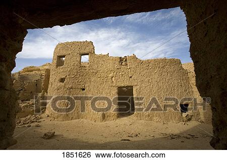Stock Photograph - Siwa Town, Siwa Oasis, Egypt; Mud-brick building in Fortress of Shali. Fotosearch