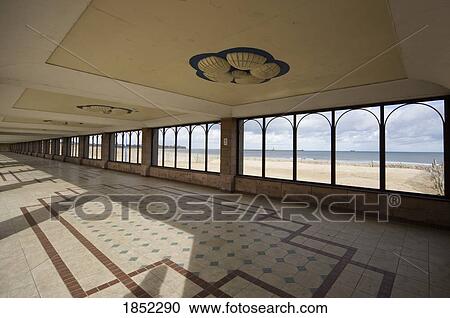 Stock Image - South Shields, Tyne and Wear, England; Empty ballroom looking out to a beach. Fotosearch