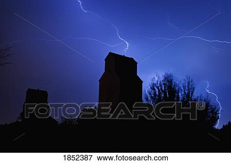 St. Albert, Alberta, Canada; Lightning over grain elevators View Large Photo Image Stock Photo - St. Albert, Alberta, Canada; Lightning over grain elevators. Fotosearch