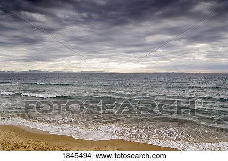 Storm clouds over water View Large Photo Image Picture - Storm clouds over water. Fotosearch