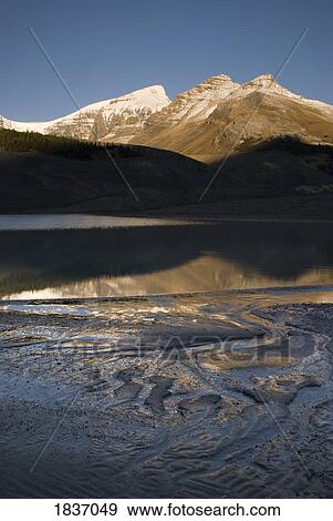 Sunwapta Lake, Jasper National Park, Jasper, Alberta, Canada View Large Photo Image Stock Photo - Sunwapta Lake, Jasper National Park, Jasper, Alberta, Canada. Fotosearch