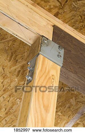 Stock Photo - Support beam; New home construction. Fotosearch