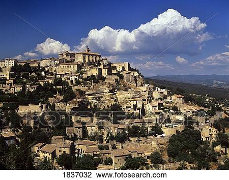 The French cliff top village of Gordes in the Luberon, Provence, France View Large Photo Image Stock Image - The French cliff top village of Gordes in the Luberon, Provence, France . Fotosearch