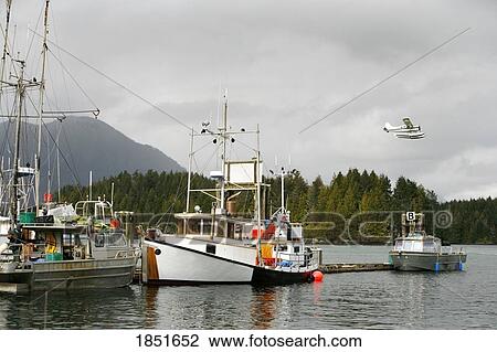 Stock Image - Tofino, Vancouver Island, British Columbia, Canada; Fishing boats in harbor. Fotosearch