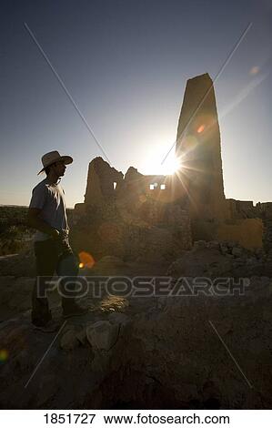 Stock Photo - Tourist, Aghurmi, Siwa Oasis, Egypt; A male tourist at the remains of the oracle temple of Amun. Fotosearch