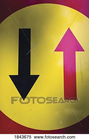 Stock Photography - Traffic sign with red and black arrows declaring right of way. Fotosearch