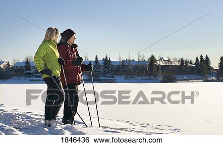 Stock Photograph - Two people in cross country skis. Fotosearch