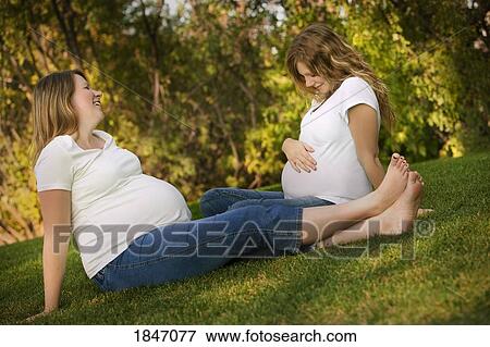 Two pregnant women View Large Photo Image Stock Photo - Two pregnant women. Fotosearch