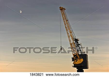 Tyne and Wear, Sunderland, England; Crane against evening sky View Large Photo Image Stock Image - Tyne and Wear, Sunderland, England; Crane against evening sky. Fotosearch