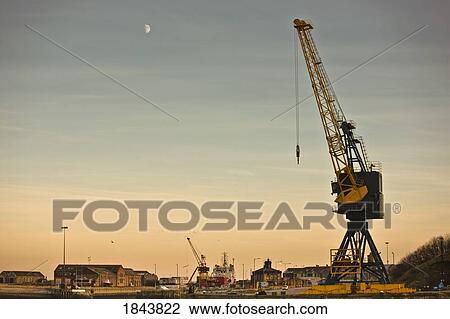 Stock Image - Tyne and Wear, Sunderland, England; Crane and buildings. Fotosearch