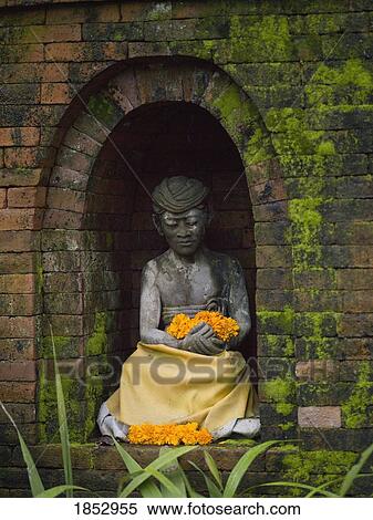 Ubud, Bali, Indonesia; Stone Buddha statue View Large Photo Image Stock Photography - Ubud, Bali, Indonesia; Stone Buddha statue. Fotosearch
