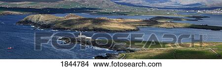 Valentia Island, County Kerry, Ireland, Lighthouse and Cahirciveen in the distance View Large Photo Image Picture - Valentia Island, County Kerry, Ireland, Lighthouse and Cahirciveen in the distance. Fotosearch