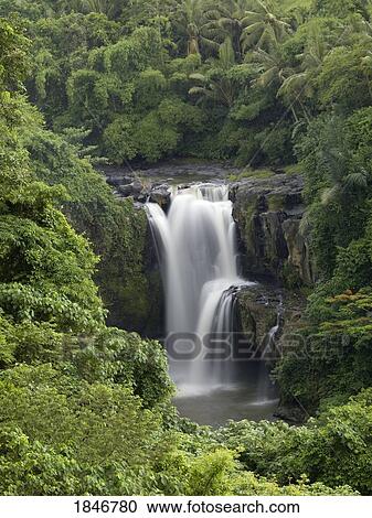 Waterfall flowing into a river, Bali, Indonesia View Large Photo Image Stock Image - Waterfall flowing into a river, Bali, Indonesia. Fotosearch