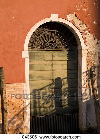 Stock Photograph - Weathered doorway, Venice, Italy . Fotosearch