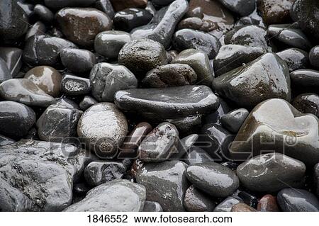 Stock Image - Wet rocks. Fotosearch