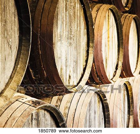 Wine barrels in a distillery cellar View Large Photo Image Stock Photo - Wine barrels in a distillery cellar . Fotosearch
