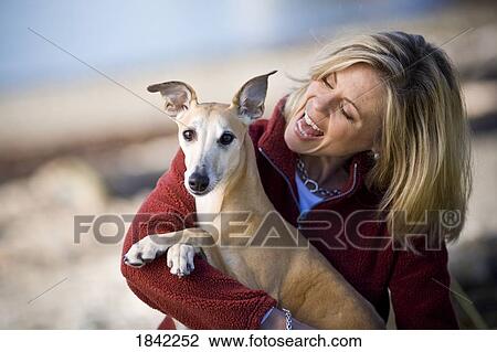 Woman and her dog View Large Photo Image Stock Image - Woman and her dog. Fotosearch