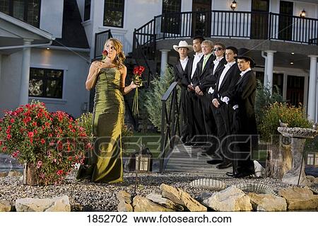 Woman in a formal dress; Woman making a choice in men View Large Photo Image Stock Image - Woman in a formal dress; Woman making a choice in men. Fotosearch