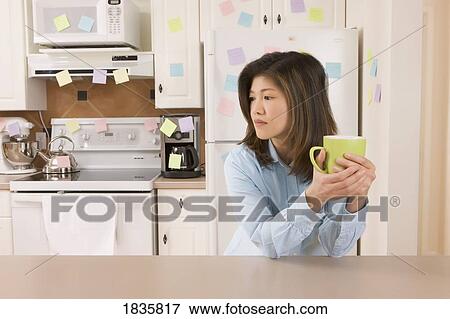 Woman taking a coffee break View Large Photo Image Stock Photo - Woman taking a coffee break. Fotosearch