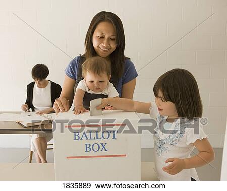 Woman voting with kids View Large Photo Image Stock Photo - Woman voting with kids. Fotosearch