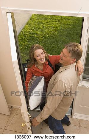 Young adult coming home View Large Photo Image Stock Photo - Young adult coming home. Fotosearch