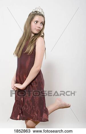 Young girl; Dreaming of being a princess View Large Photo Image Stock Image - Young girl; Dreaming of being a princess . Fotosearch
