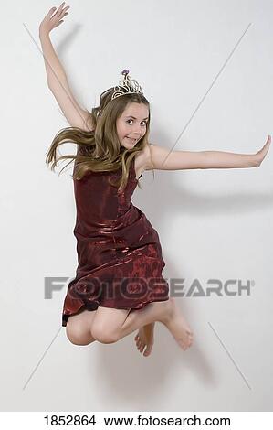 Young girl; Young princess jumping View Large Photo Image Picture - Young girl; Young princess jumping. Fotosearch