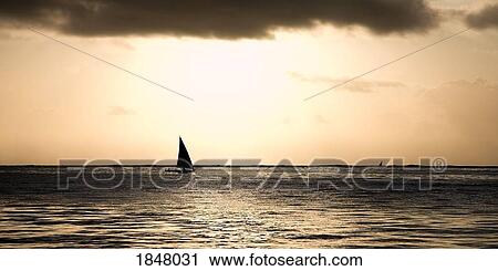 Zanzibar, Tanzania; Sailing into the sunset View Large Photo Image Stock Image - Zanzibar, Tanzania; Sailing into the sunset . Fotosearch