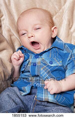 Stock Image - Baby yawns. Fotosearch