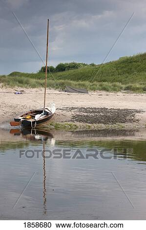 Beached sailboat, Alnmouth, Northumberland, England View Large Photo Image Stock Image - Beached sailboat, Alnmouth, Northumberland, England. Fotosearch