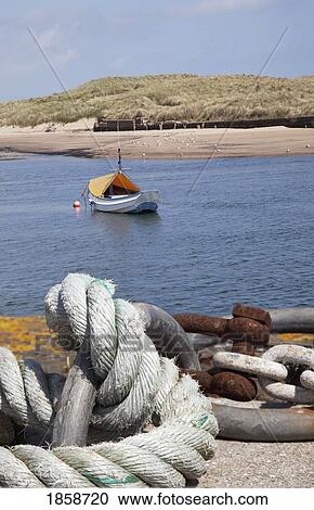 Boat and dock, Amble Harbor, Northumberland, England View Large Photo Image Stock Image - Boat and dock, Amble Harbor, Northumberland, England. Fotosearch