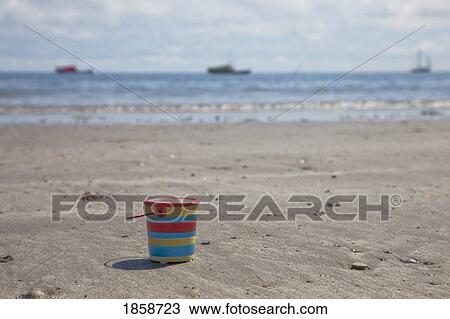 Bucket on the beach; Northumberland, England View Large Photo Image Stock Image - Bucket on the beach; Northumberland, England. Fotosearch
