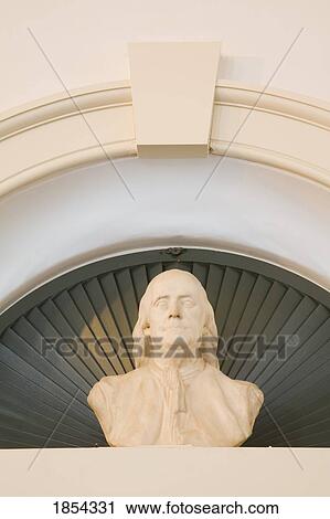 Stock Image - Bust of Ben Franklin, Congress Hall, Independence National Historical Park; Philadelphia, Pennsylvania, USA. Fotosearch
