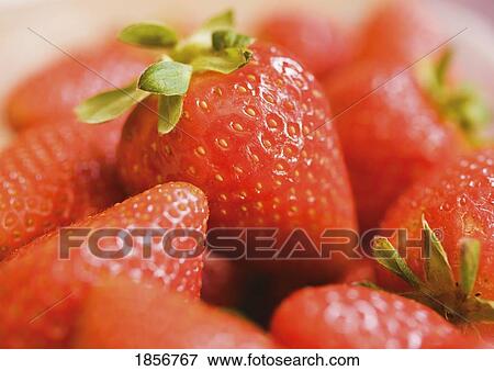 Stock Photo - Close-up of fresh strawberries. Fotosearch