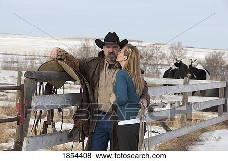 Couple on a ranch View Large Photo Image Stock Photo - Couple on a ranch. Fotosearch