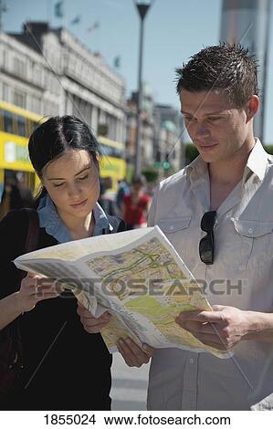 Picture - Couple reading a map. Fotosearch