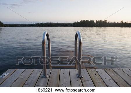Dock with ladder, Lake of the Woods, Ontario, Canada View Large Photo Image Stock Image - Dock with ladder, Lake of the Woods, Ontario, Canada. Fotosearch