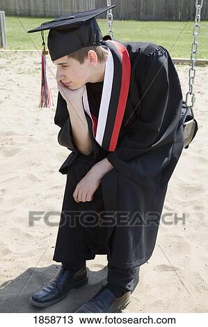 Graduate on a swing View Large Photo Image Stock Image - Graduate on a swing. Fotosearch