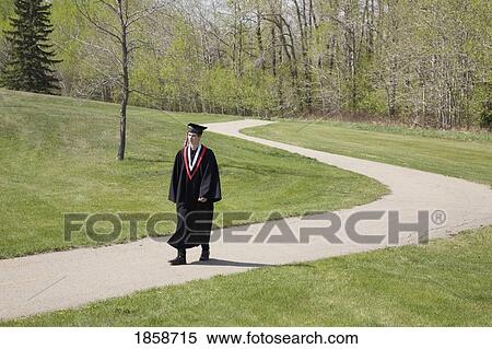 Stock Photography - Graduate walking a path. Fotosearch