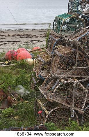 Lobster traps, Boulmer Beach; Northumberland, England View Large Photo Image Picture - Lobster traps, Boulmer Beach; Northumberland, England. Fotosearch
