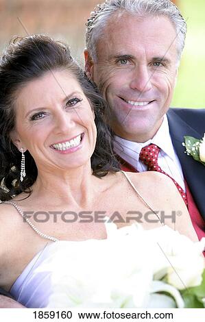 Middle aged couple getting married View Large Photo Image Stock Image - Middle aged couple getting married. Fotosearch