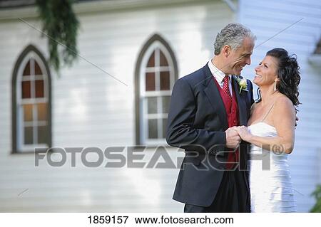Middle aged couple getting married View Large Photo Image Stock Photo - Middle aged couple getting married. Fotosearch