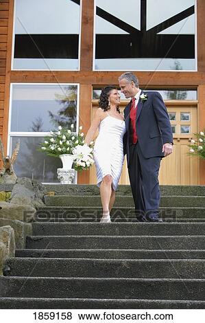 Middle aged couple getting married View Large Photo Image Stock Photo - Middle aged couple getting married. Fotosearch