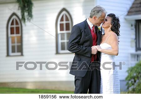 Middle aged couple getting married View Large Photo Image Stock Photograph - Middle aged couple getting married. Fotosearch