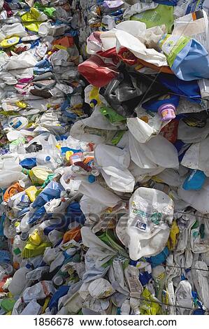 Stock Photo - Mounds of plastic and metal for recycling. Fotosearch