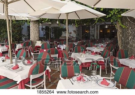 Outdoor restaurant, Marbella, Malaga Province, Costa del Sol, Spain View Large Photo Image Picture - Outdoor restaurant, Marbella, Malaga Province, Costa del Sol, Spain. Fotosearch