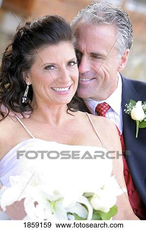 Stock Photo - Portrait of a bride and groom. Fotosearch